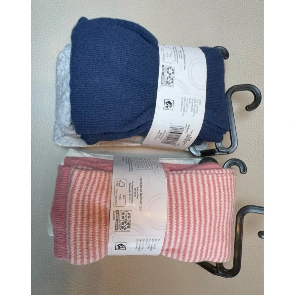 Four pairs of toddler girls cotton tights size 6-18 months.